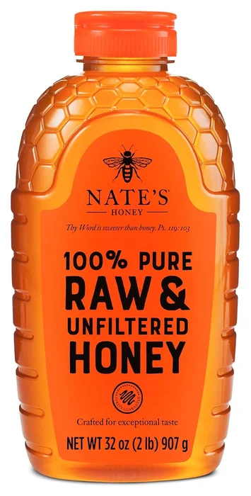 Nate's 100% Pure Raw and Unfiltered Honey, 32-ounce squeeze bottle with an orange label and a honeycomb-pattern shoulder